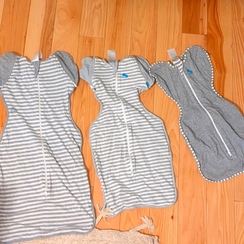 Three love to dream swaddles. Small medium and Large